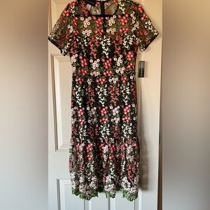 New, size 10 Donna Morgan dress. So unique.